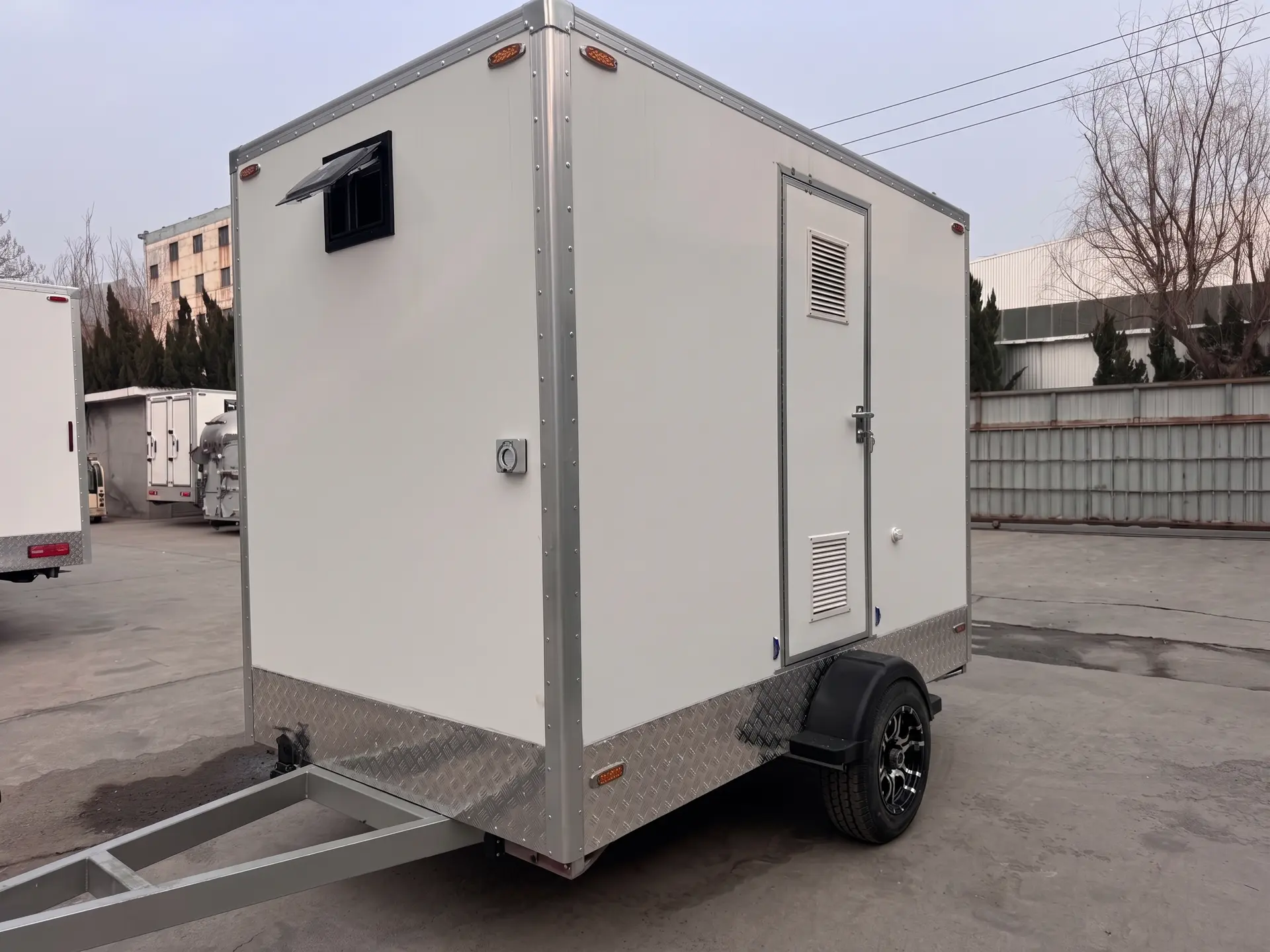 Luxury Loos restroom trailer rental in Tulsa, Oklahoma — exterior side view