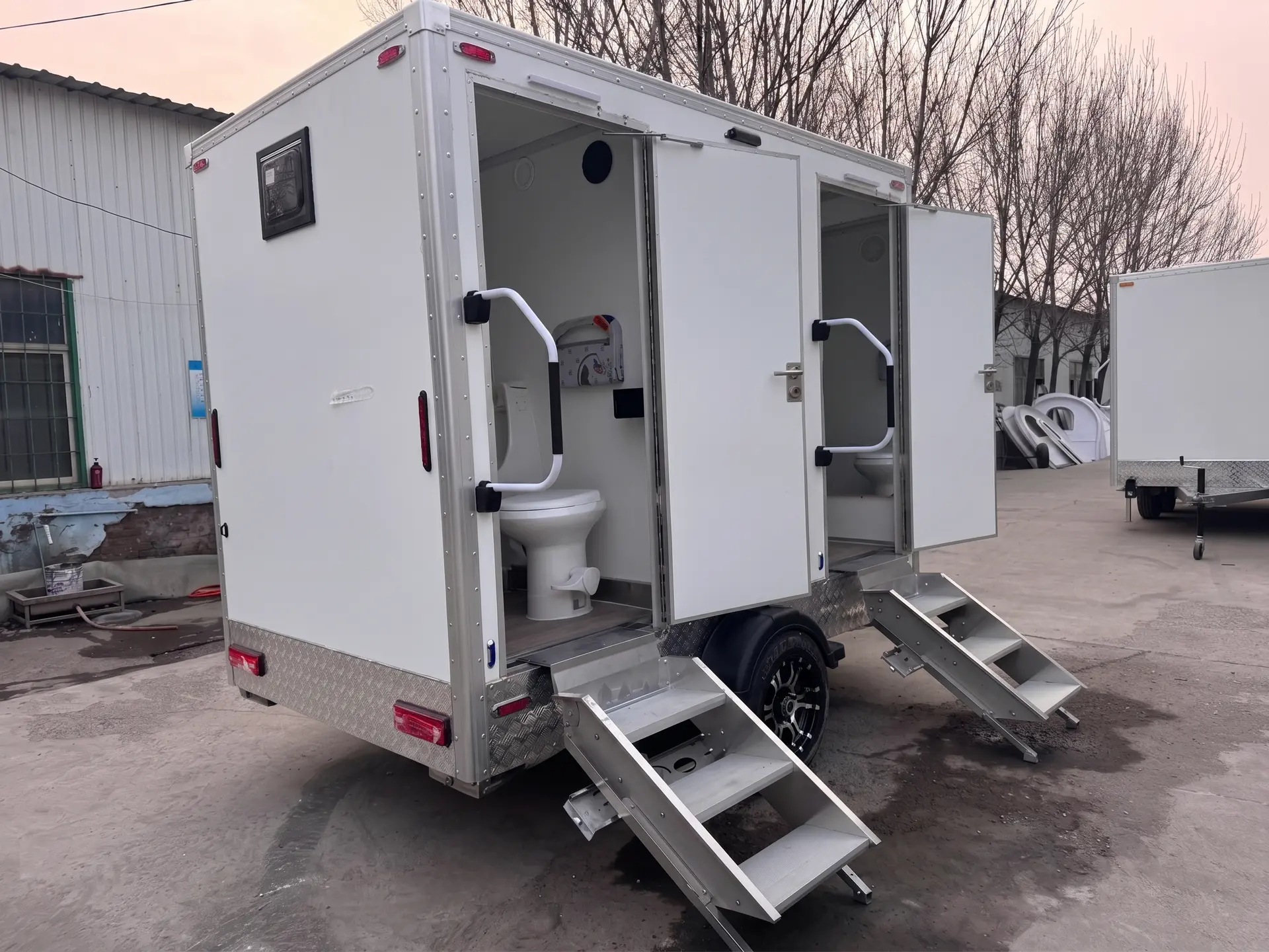 Luxury Loos restroom trailer with open stalls